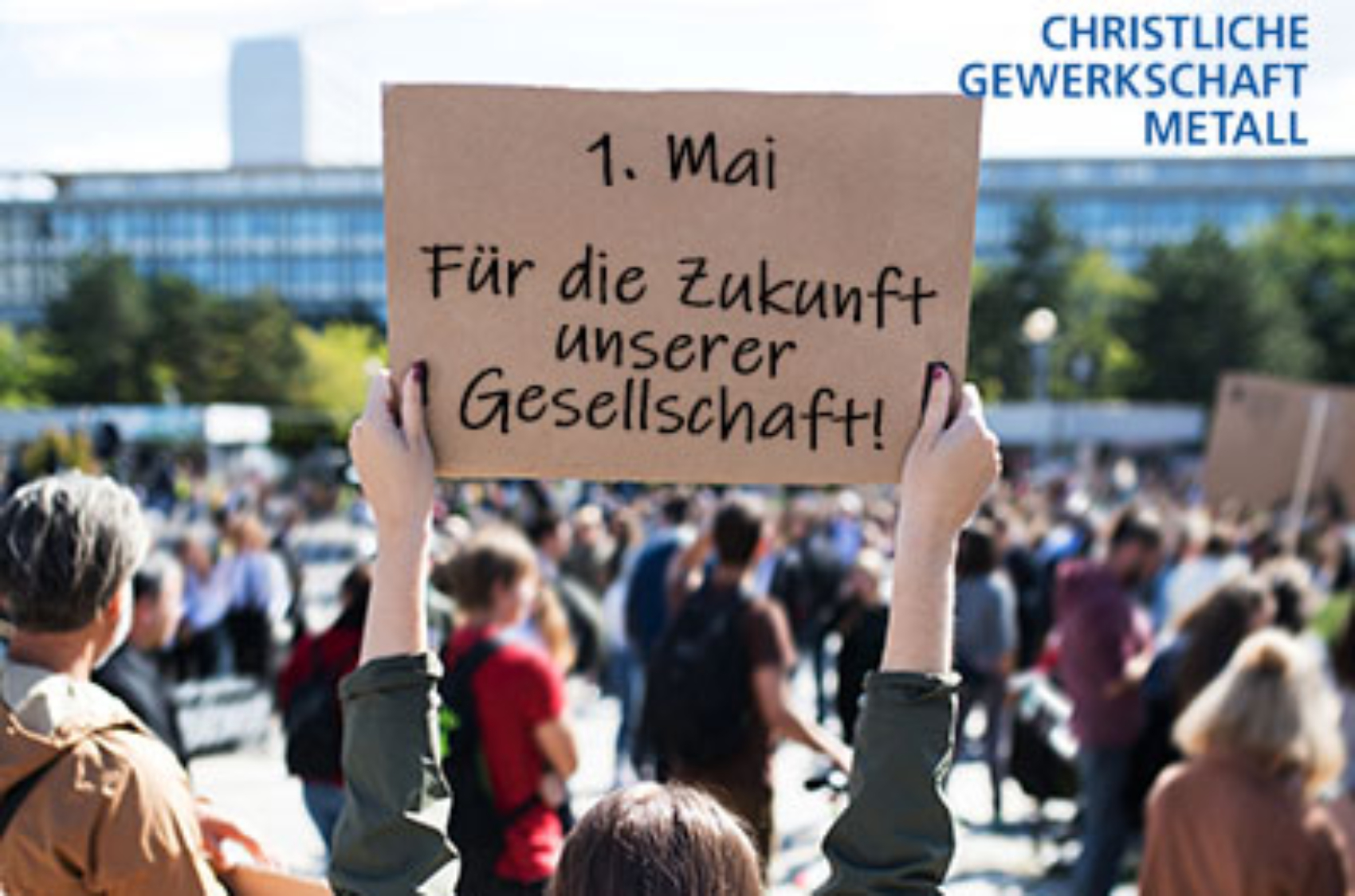 A rear view of people with placards and posters on global strike for climate change. Copy space.