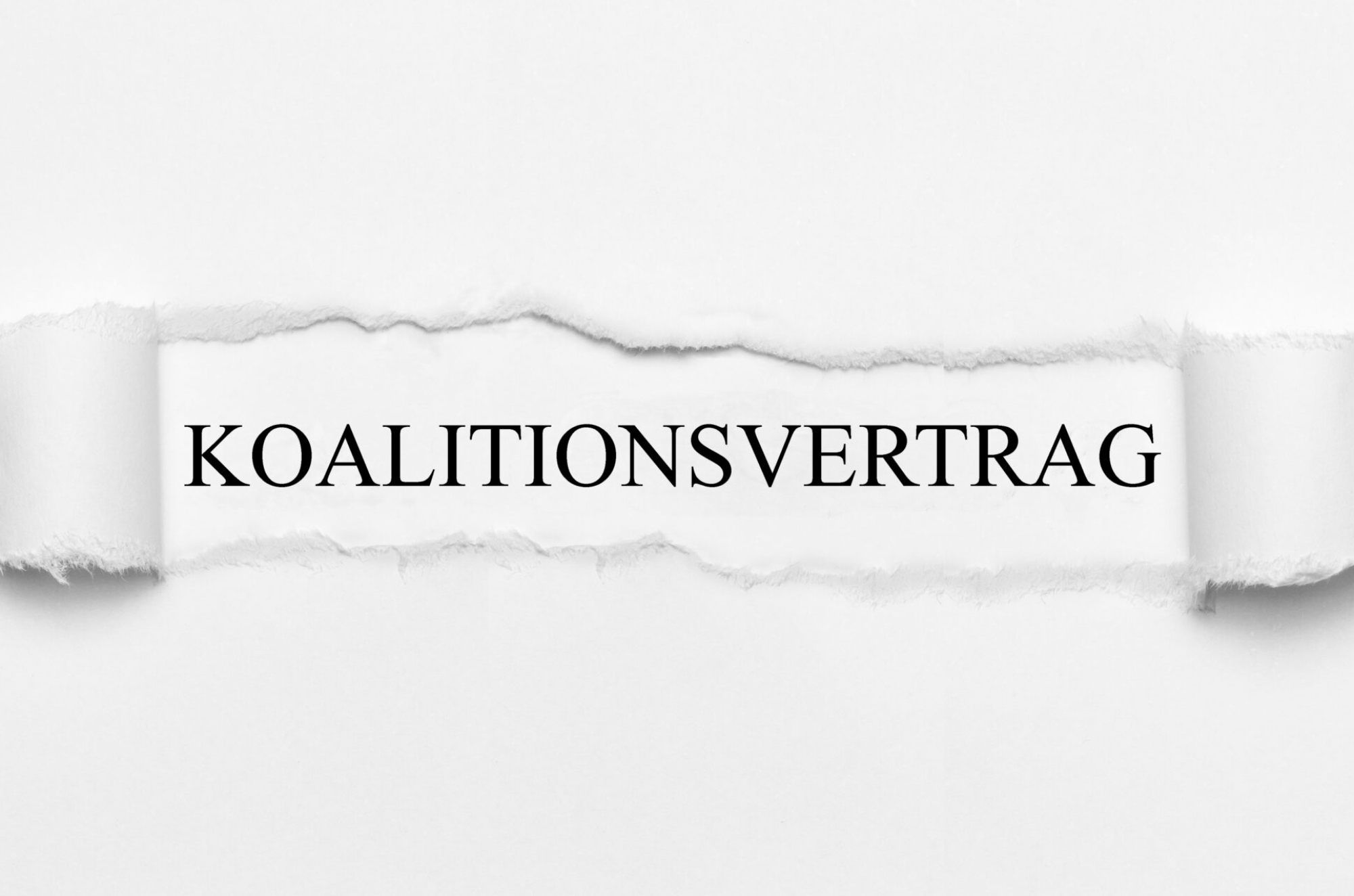 Koalitionsvertrag auf weißen gerissenen Papier